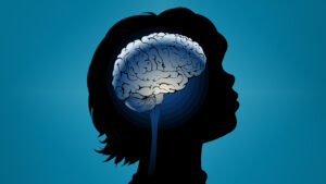 Silhouette of a child's head with an illustrated brain, symbolizing neurological activity and brain development in autism.
